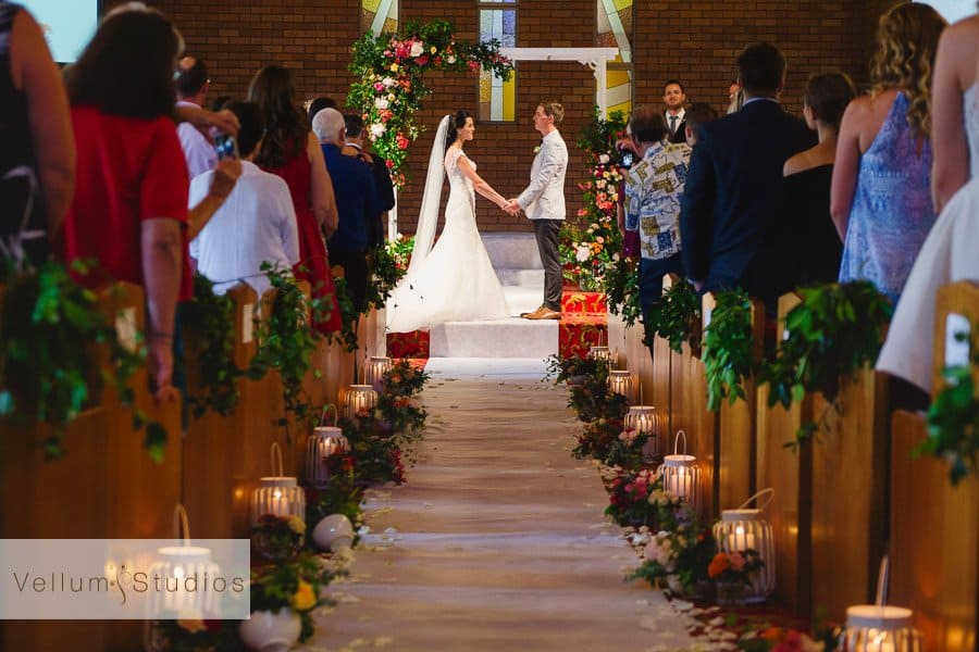 Casuarina-Wedding-Photographer-flowers in aisle